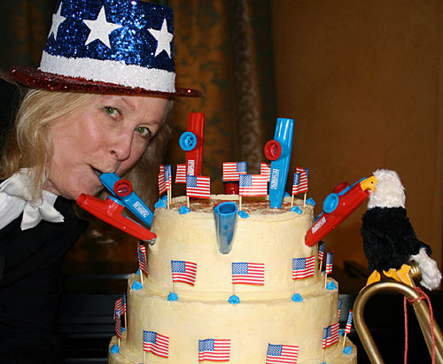 Barbara Stewart and Kazooby the Eagle keep America humming with a 2009 Joyful Noise National Kazoo Day Cake.